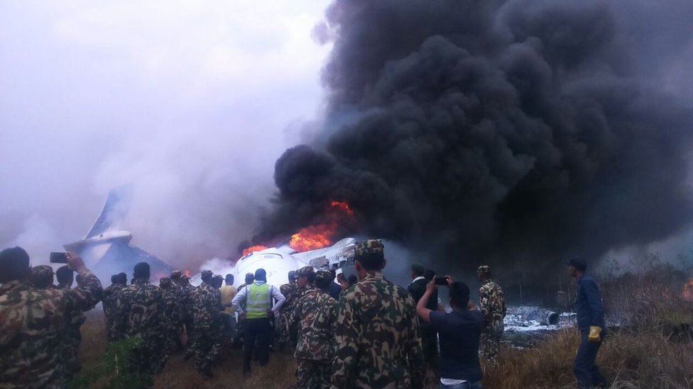 Wreckage of the plane at Kathmandu airport, Nepal, 12 March 2018