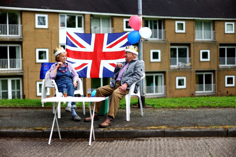 People at a street party during celebrations for the Big Lunch, in Newcastle-under-Lyme, Britain, May 7, 2023