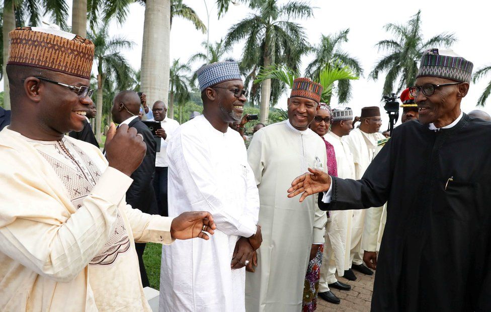 Nigeria"s President Muhammadu Buhari is received by some state governors at at Nnamdi Azikiwe airport in Abuja, Nigeria August 19, 2017 after his return from three months medical trip in Britain. Nigeria Presidency