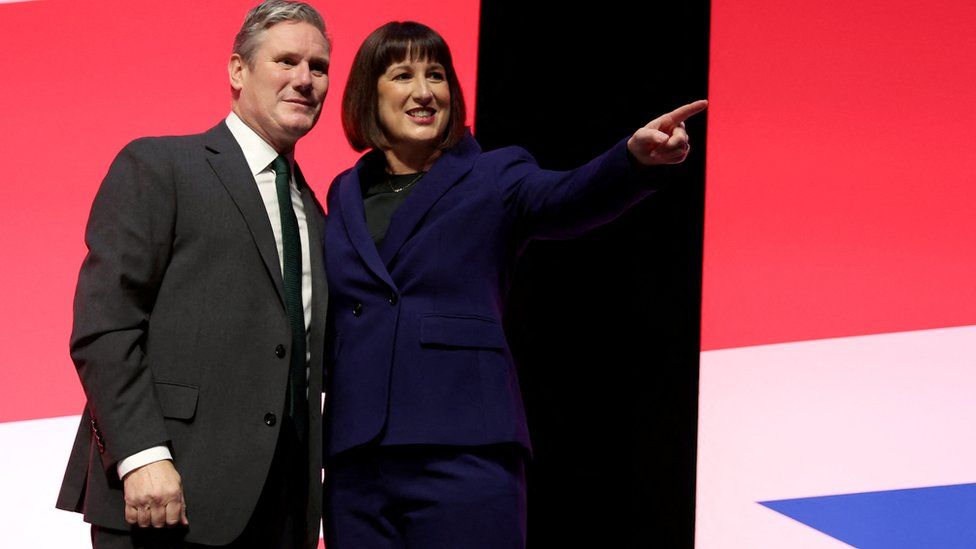 Britain's Labour Party Leader Keir Starmer stands with Shadow Chancellor of the Exchequer Rachel Reeves following her keynote speech during the Labour Party annual conference in Liverpool,