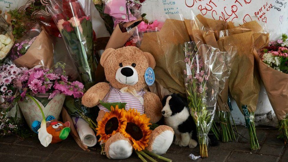 Teddy bears outside Grenfell Tower