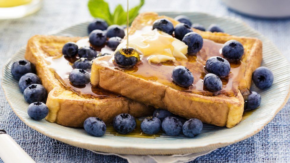 Toast with butter and blueberries