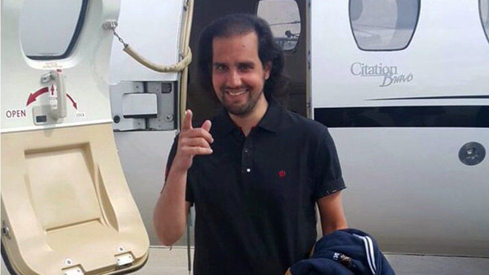 A handout picture released by the Inter Services Public Relations of Pakistan (ISPR) on 9 March 2016 show Shahbaz Taseer, son of slain Punjab governor Salman Taseer, gesturing before boarding a chartered plane in Quetta on his way to Lahore, Pakistan, 9 March 2016.