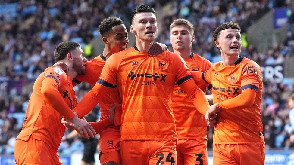 Kieffer Moore, celebrating with his Ipswich Town teammates, after his midweek goal contributed to a big 2-1 win away at Coventry.