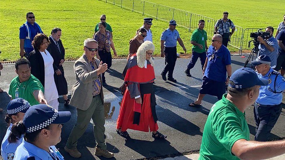 Samoa's Chief Justice Satiu Simativa Perese arrives at parliament in Apia on May 24, 2021, as he and Samoa's prime minister-elect Fiame Naomi Mata'afa were locked out of the Pacific nation's parliament as Mata'afa's political rival refused to accept electoral defeat prompting claims of a coup.