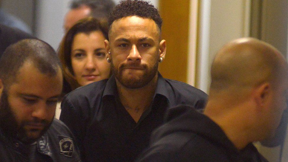 Brazilian football player Neymar leaves a police station after testifying in Rio de Janeiro, Brazil, 6 June