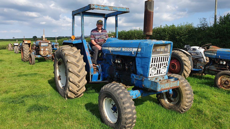 Phil Warren sat on tractor