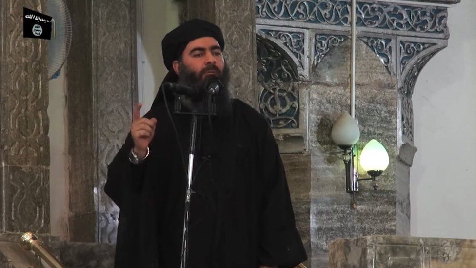 Abu Bakr al-Baghdadi addresses worshippers at the Great Mosque of al-Nuri in Mosul, Iraq, on 5 July 2014