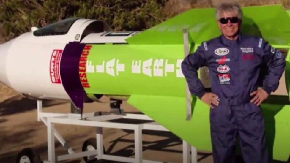 Mike Hughes in front of his rocket