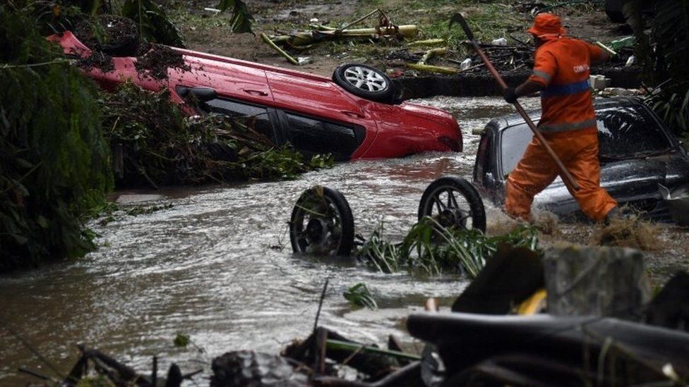 A rescuer works in Realengo neighbourhood, in the suburbs of Rio de Janeiro, Brazil. Photo: 2 March 2020