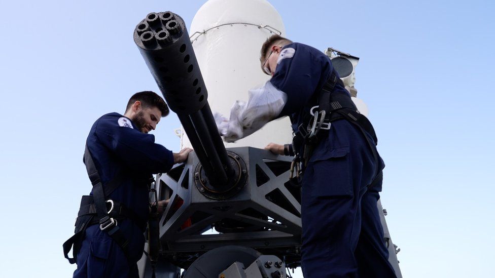 Sailors preparing Phalanx machine gun on HMS Diamond