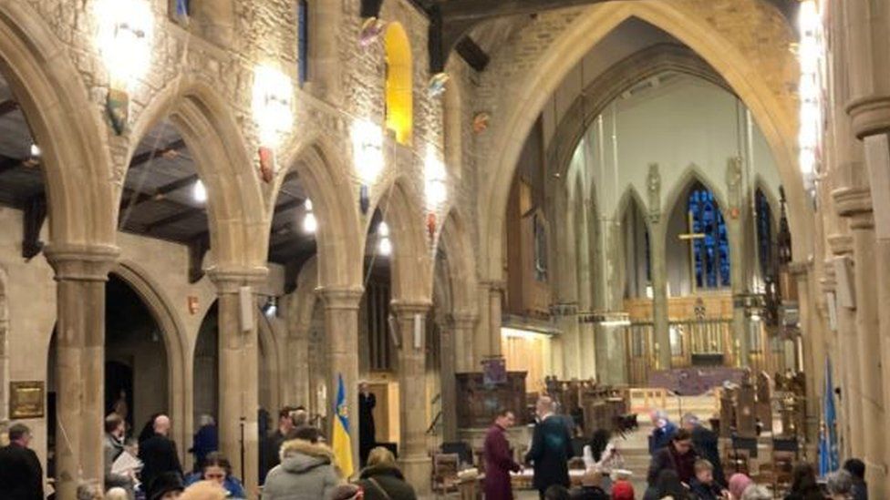 People gathered at Bradford Cathedral for a Vigil for Peace in Ukraine
