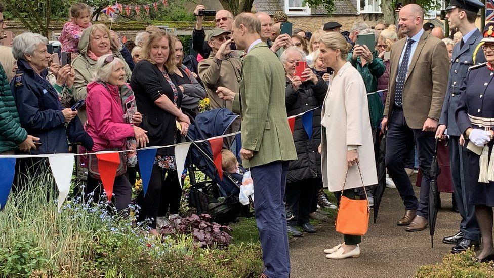Duke and Duchess of Edinburgh greet people