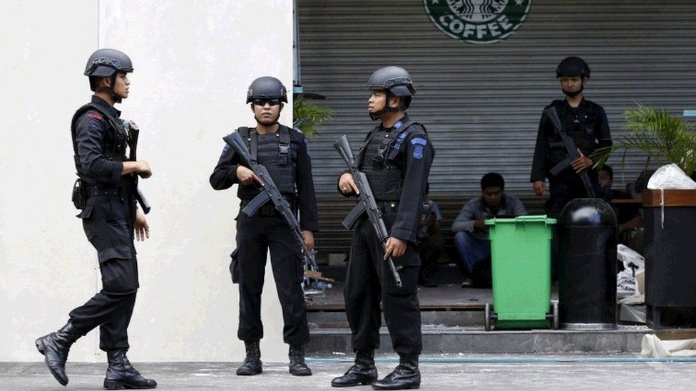 Indonesian police stand guard at the site of a militant attack in central Jakarta, Indonesia in this January 16, 2016