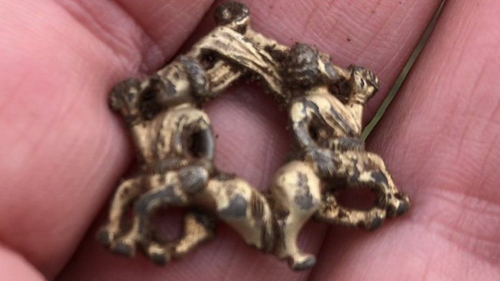 The brooch shortly after it was found