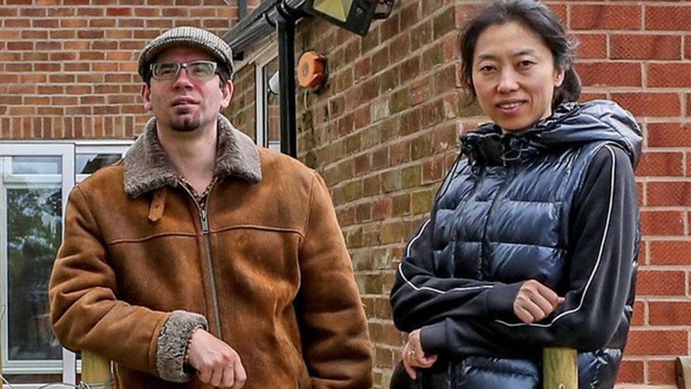 Matt Raw and his partner Ying at home in Knutsford, Cheshire