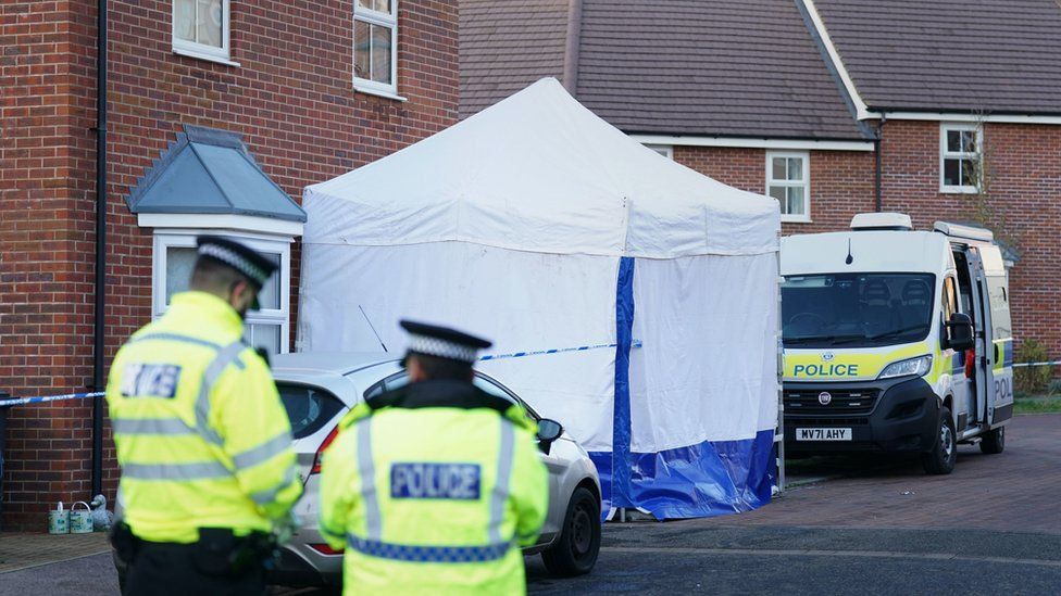 Police and a forensics tent in Allan Bedford Crescent, Queen's Hills