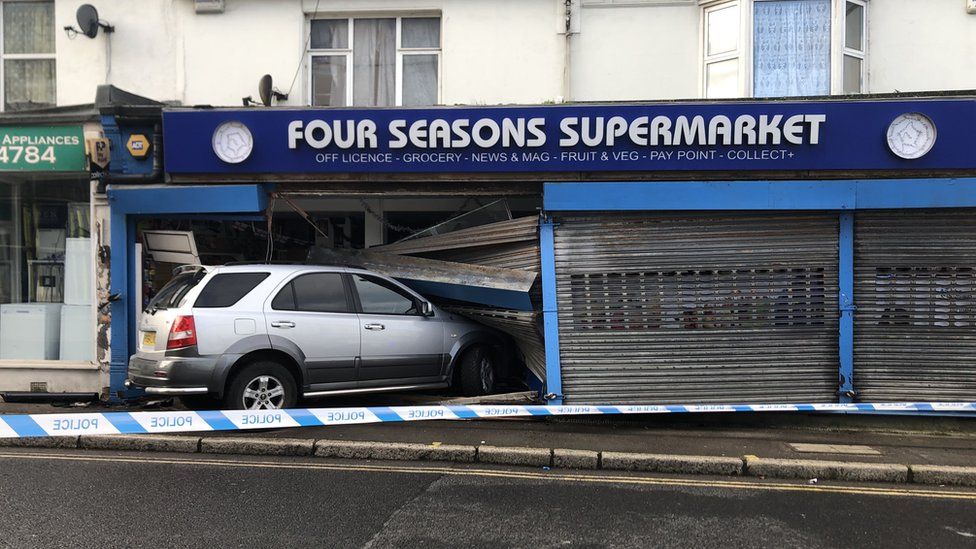 Seaford café crash Three injured after car hits shop BBC News