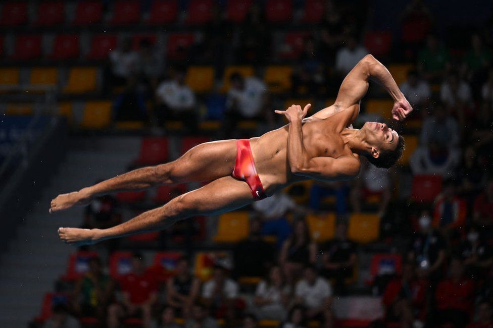 Egypt's Mohamed Farouk competes in the semi-final of the men's 3m springboard diving event.