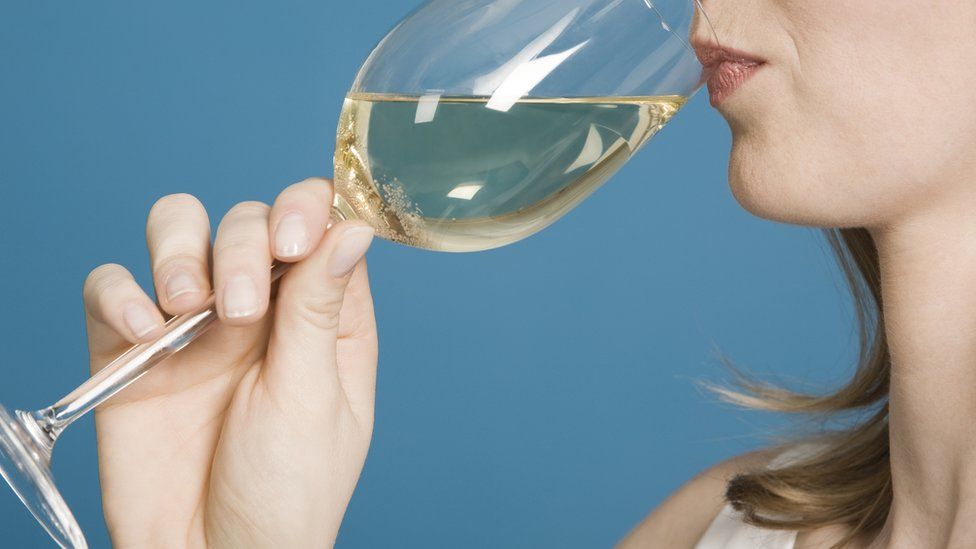 woman drinking wine