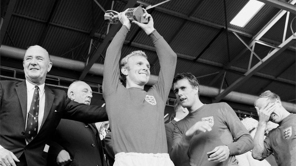 Bobby Moore lifts the World Cup trophy in 1966
