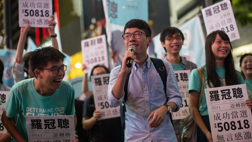Newly elected legislator Nathan Law Kwun-chung (C) thanks his supporters during a rally in Causeway Bay, Hong Kong, China, 05 September 2016.