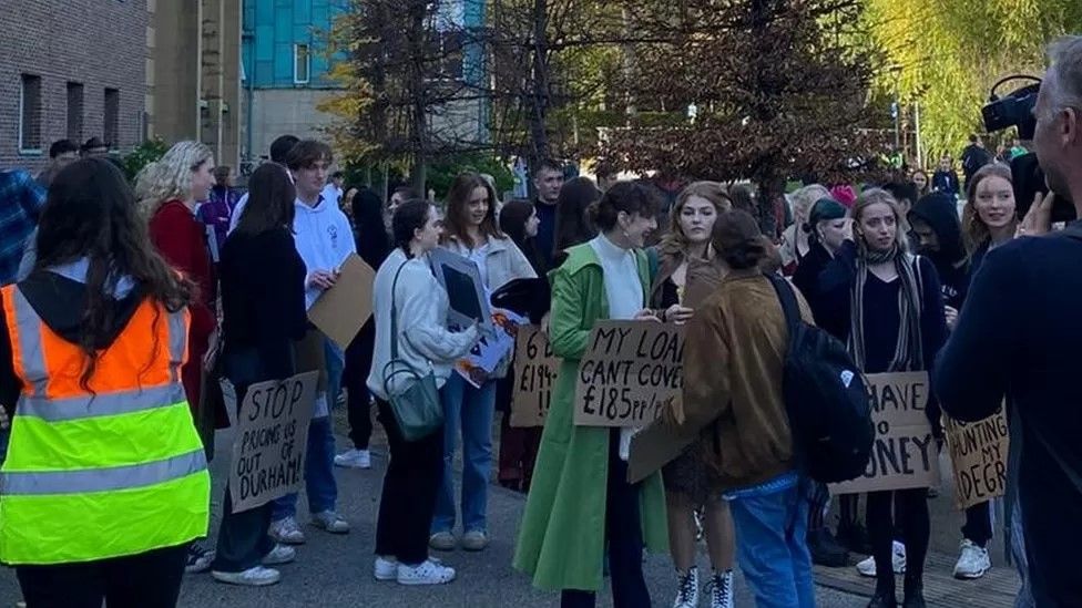 Students protesting outside the university