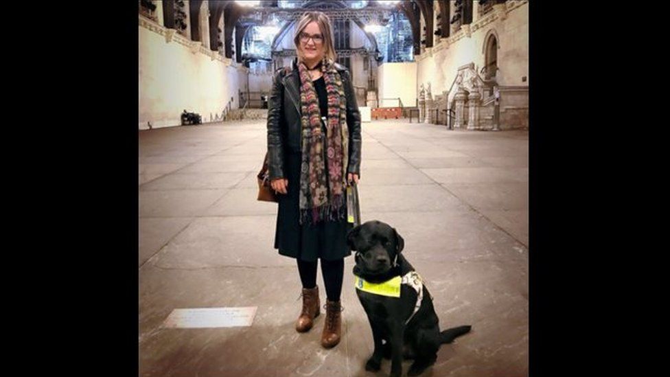 Kirsty James with her guide dog