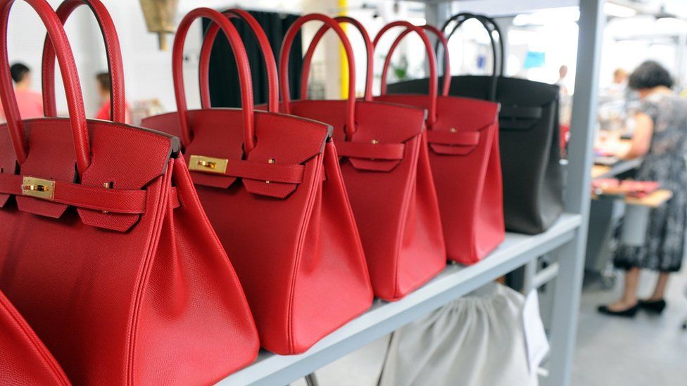 File image of luxury handbags on a shelf