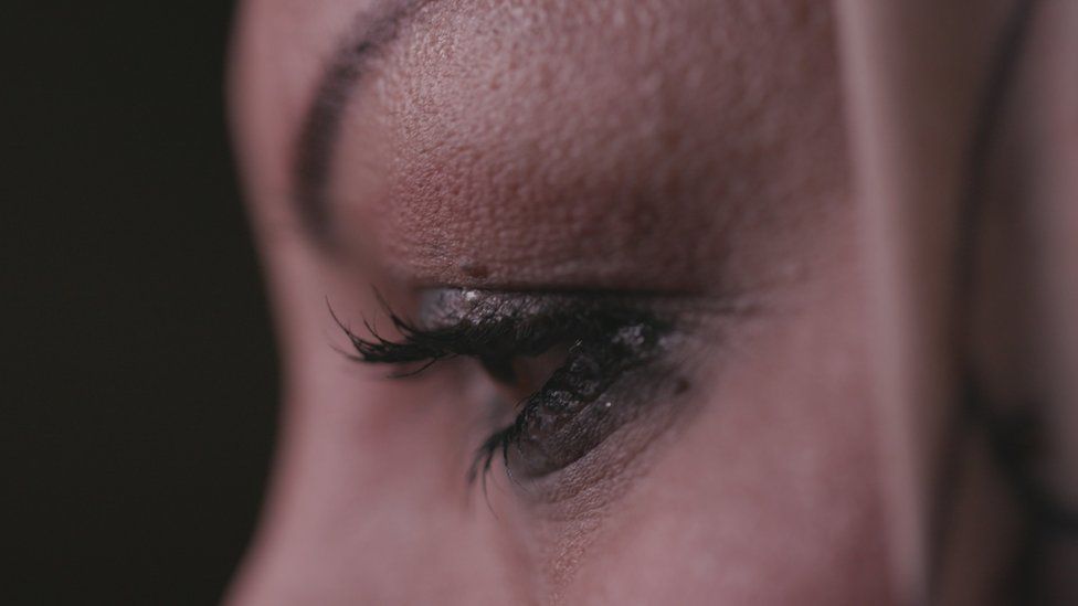 A close-up of a woman's face