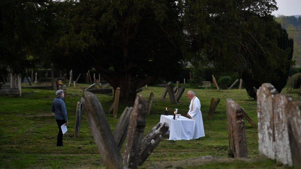 The Vicar of Brenchley conducts an Easter service to one person