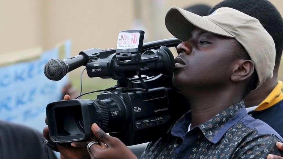 A camera man in Lagos, 28 October 2015