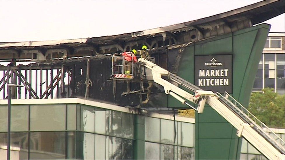 Dozens of firefighters tackle Birmingham Morrisons roof blaze BBC News