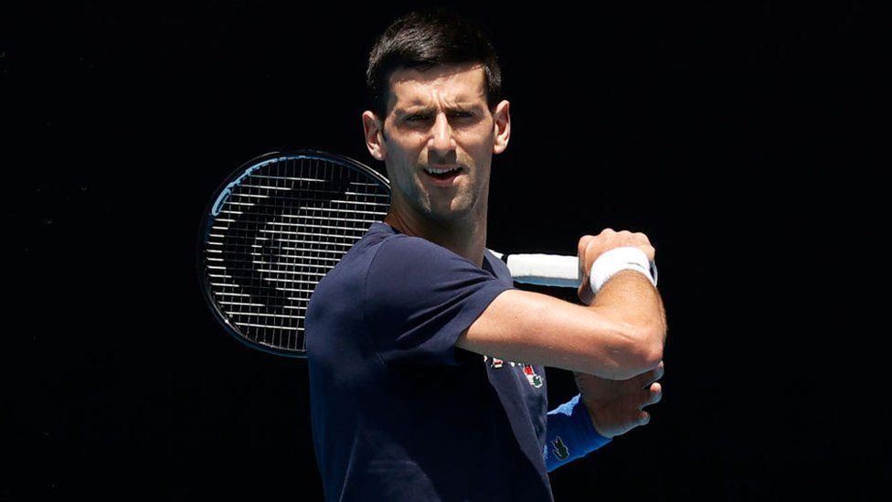 Novak Djokovic of Serbia plays a forehand shot during a practice session ahead of the 2022 Australian Open at Melbourne Park on January 12, 2022 in Melbourne, Australia.