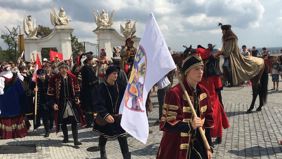 Image shows a medieval re-enactment in Bratislava