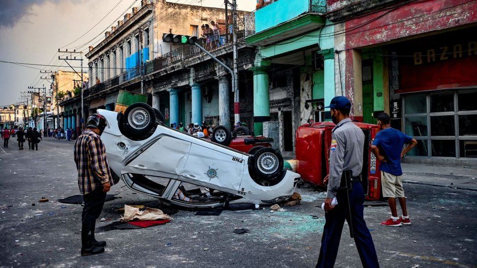 Cars overturned by protesters in Havana, July 2021