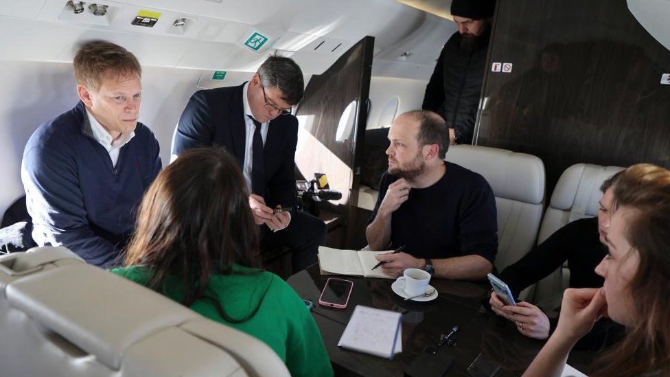 Defence Secretary Grant Shapps and reporters on board the aircraft for the Poland trip
