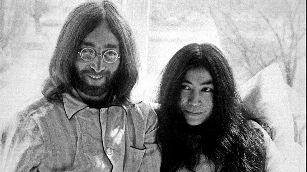 File image taken 25 March 1969 shows late Beatles singer John Lennon and his wife, Yoko Ono, at the Hilton Hotel in Amsterdam