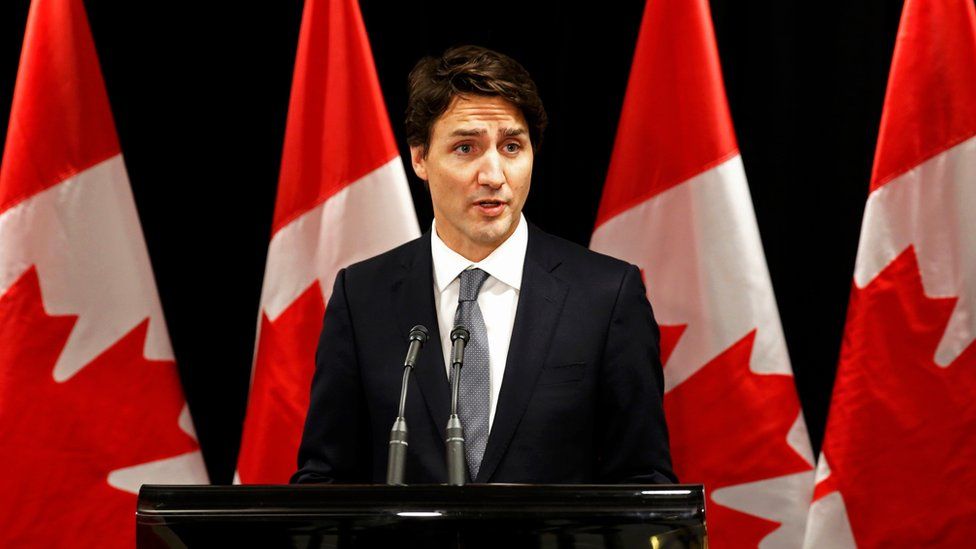 Canadian Prime Minister Justin Trudeau speaks about a Saskatchewan school shooting during a news conference in Davos, January 22, 2016.