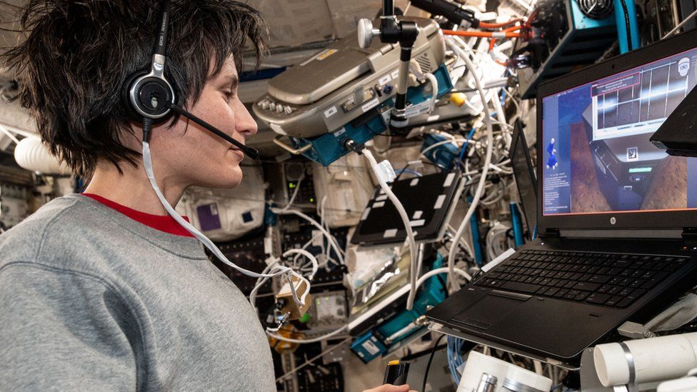 Cristoforetti working on projects at the International Space Station