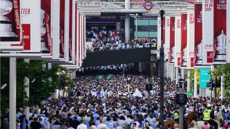 Hundreds of fans walk down Wembley Way