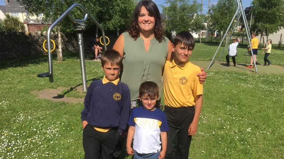 Danielle Farrell and her children who attend Lixwm Primary School