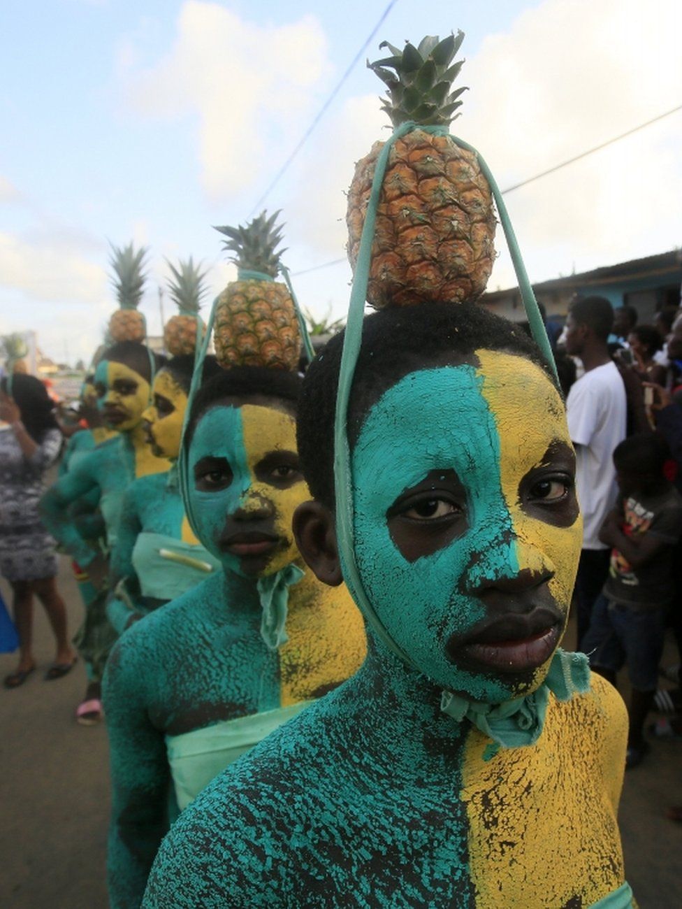 Ivorians take part in a parade on the last day of the 38th Popo Carnival in Bonoua, 60km south of Abidjan, Ivory Coast, 14 April 2018. The carnival of Bonoua is the Ivoirians version of Mardi Gras running for a week. Derived from at first a celebration of the cultural heritage of the Aboure people, the Popo Carnival involves gastronomic competitions, Miss pageants, sports days, a festival of traditional dances and reflection workshops on Popo museum amongst other activities.