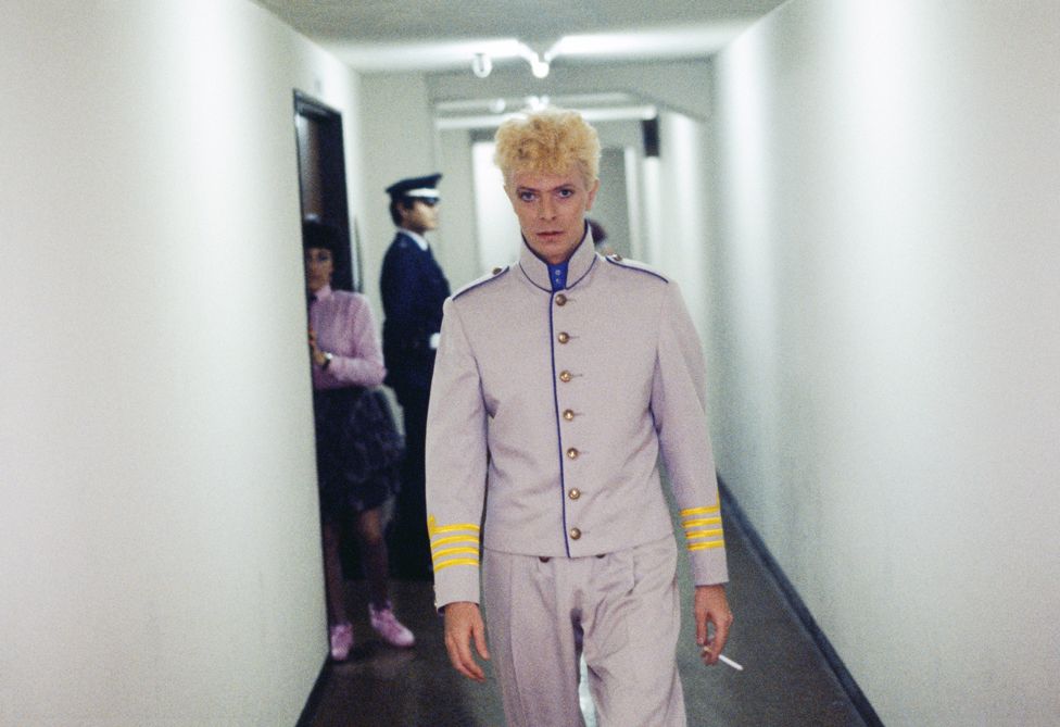 David Bowie backstage in Japan, heading towards the stage.