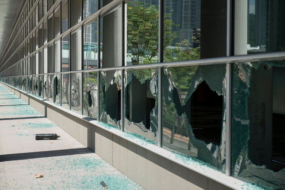 This image shows shattered glass windows at the MTR train station in Tseung Kwan O, a residential area in Hong Kong on October 5, 2019