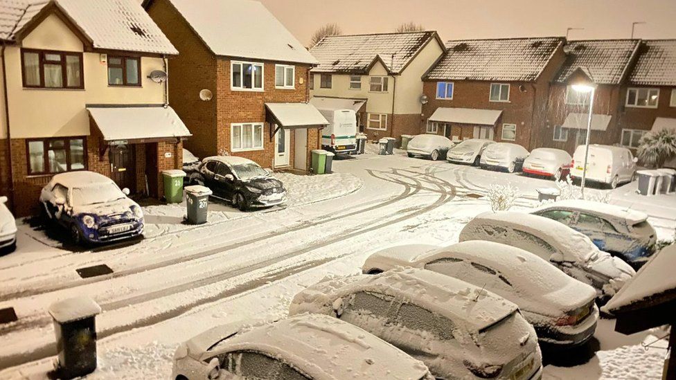 Snow on cars in Wellingborough