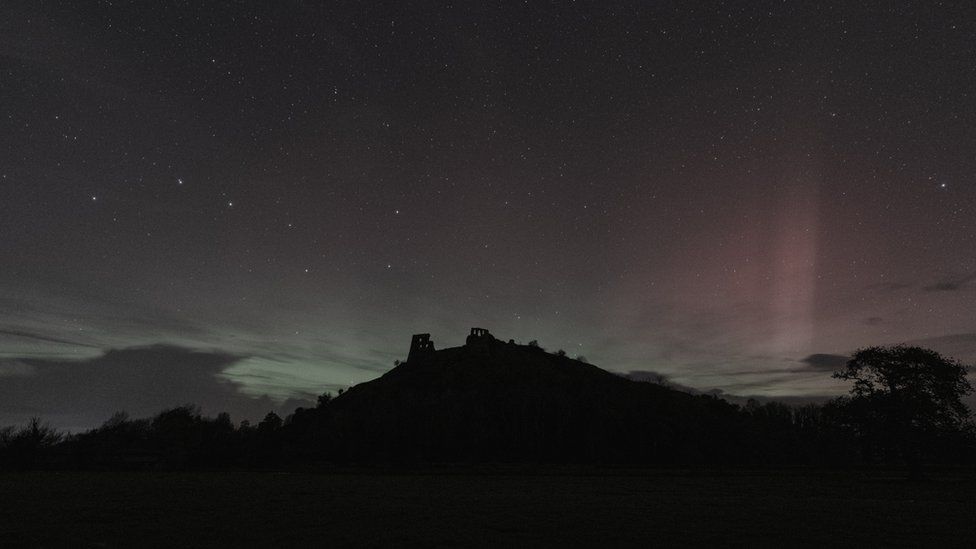 Edited image of Northern Lights over Dryslwyn Castle in Carmarthenshire