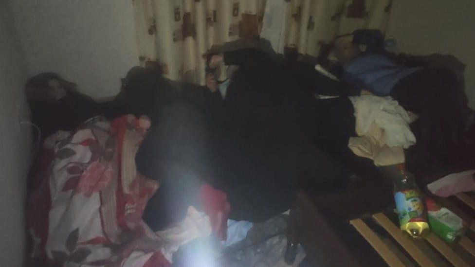 Cramped conditions in Maxim's flat in Mariupol