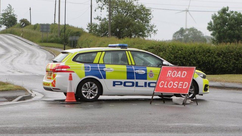 Police near to Staveley Road, in Duckmanton, near Chesterfield, Derbyshire