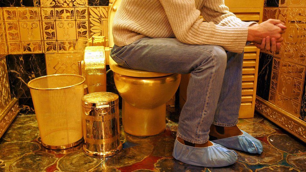 A solid gold and gem-encrusted toilet valued at 38,000,000 million Hong Kong dollars (4.8 million USD), pictured in 2005